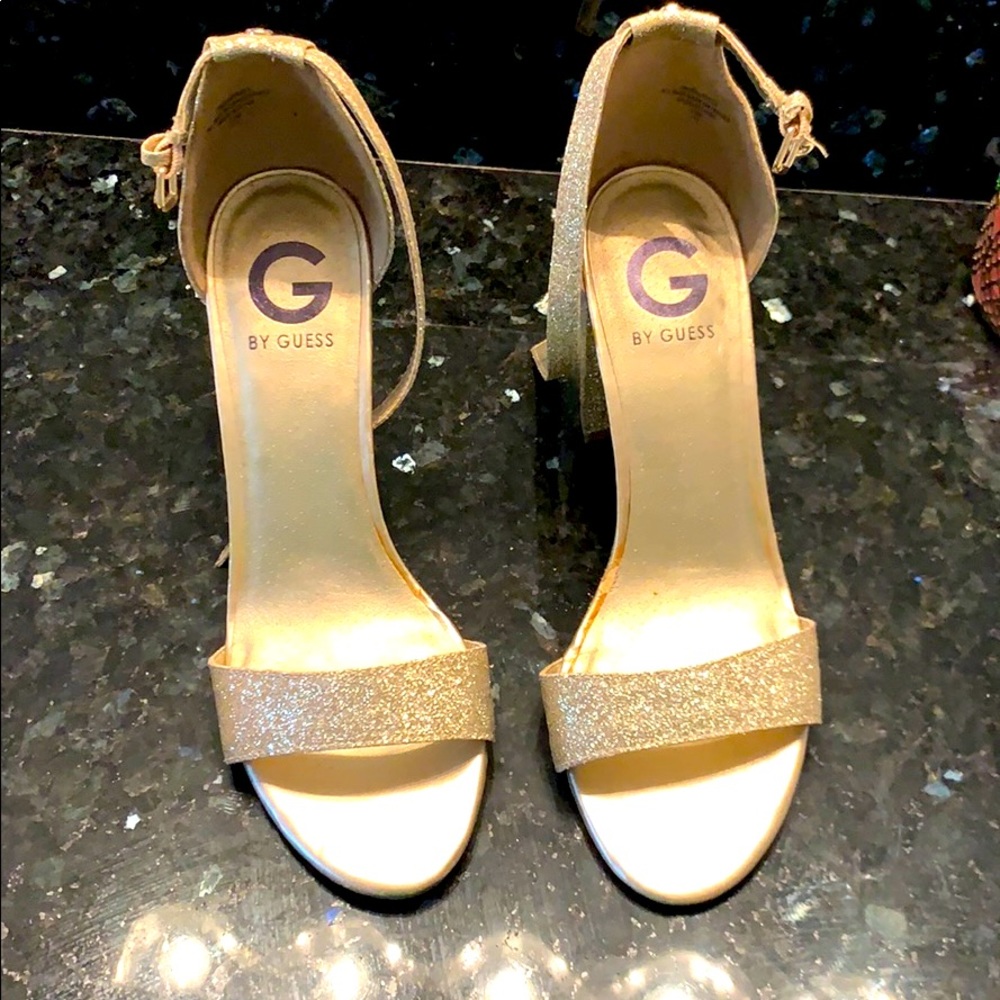 Gold glitter heels by Guess